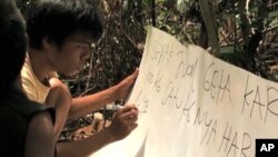 Students work together at a unique school in a remote rainforest on the Indonesian island of Sumatra