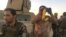 FILE - Kurdish Peshmerga soldiers observe the ongoing battle on Oct. 20, 2017 in Altun Kobri, a disputed area of northern Iraq. (H.Murdock/VOA)