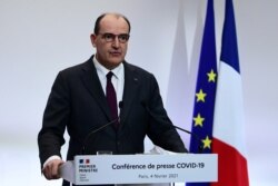 FILE - French Prime Minister Jean Castex delivers a press conference on the current French government strategy for the ongoing COVID-19 pandemic on Feb. 4, 2021, in Paris.