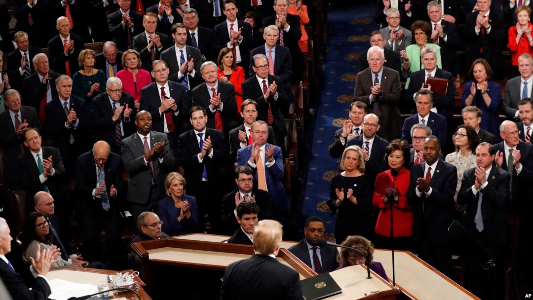 Republicans stand as President Donald Trump delivers his State of the Union address to a joint session of Congress on Capitol Hill in Washington, Tuesday, Feb. 5, 2019. 