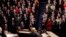 Republicans stand as President Donald Trump delivers his State of the Union address to a joint session of Congress on Capitol Hill in Washington, Tuesday, Feb. 5, 2019. 