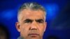 Yair Lapid, líder del partido entrista Yesh Atid, podría convertirse esta semana en el nuevo primer ministro de Israel, desplazando a Benjamín Netanyahu.