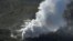 An aerial view shows Io Yama erupting in Miyazaki prefecture, on the southwest island of Kyushu, Japan, in this photo by Kyodo, April 19, 2018. 