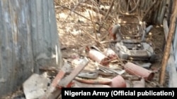 FILE—In an undated photo, Nigerian soldiers raided and destroyed a Boko Haram IED making factory inside Sambisa Forest, Borno state, northeastern Nigeria.