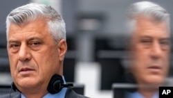 Hashim Thaci, who resigned as Kosovo's president to face charges including murder, torture and persecution, makes his first courtroom appearance before a judge at the Kosovo Specialist Chambers court in The Hague, Netherlands, Nov. 9, 2020.