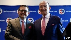 Commerce Secretary Wilbur Ross and Mexico Secretary of the Economy Ildefonso Guajardo Villarreal shake hands after a news conference at the U.S. Chamber of Commerce in Washington, June 6, about Mexico sugar exports. 