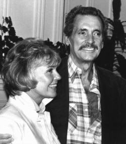 In this July 18,1985, file photo, Doris Day and Rock Hudson speak at a news conference in Monterey, Calif.