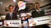 Life-sized standees of U.S. President Barack Obama, right, and Republican presidential candidate and former Massachusetts Gov. Mitt Romney decorate the entrance of American Diner chain in Singapore, "Billy Bombers" November 6, 2012. 