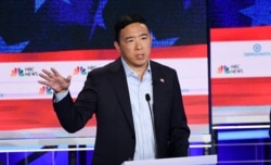 FILE - Democratic presidential hopeful U.S. entrepreneur Andrew Yang speaks in the second Democratic primary debate of the 2020 presidential campaign in Miami, June 27, 2019.