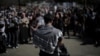 People attend a protest following the arrest by U.S. immigration agents of Palestinian student protester Mahmoud Khalil at Columbia University, in Berkeley, Calif., March 11, 2025.