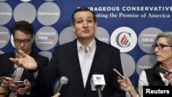 U.S. Republican presidential candidate Ted Cruz speaks with the media before a campaign rally in Las Vegas, Nevada, Feb. 22, 2016.