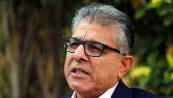 FILE - Dr. Hamid Jafari, the World Health Organization’s director of polio eradication for the Eastern Mediterranean region, speaks with The Associated Press in Islamabad, Pakistan, Oct. 19, 2021.