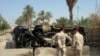 Car Bombs Kill 25 Outside Iraqi Governor's House