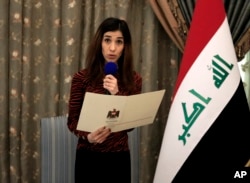 Nobel Peace Prize recipient Nadia Murad, speaks during a meeting with her country's President Barham Salih and other dignitaries, in Baghdad, Iraq, Wednesday, Dec. 12, 2018.
