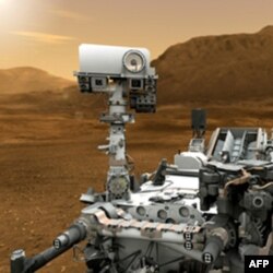 Curiosity tədqiqat aparatı Mars planetində həyatın olub olmamasını araşdıracaq (video)