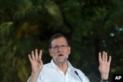 Spain's acting Prime Minister and Popular Party candidate, Mariano Rajoy speaks in Seville, Spain, June 23, 2016.