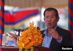 FILE - Cambodia's Prime Minister Hun Sen speaks during a groundbreaking ceremony of the Project for Flood Protection, donated by Japan, in Phnom Penh, Cambodia, March 4, 2019.