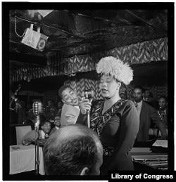 Photo of Ella Fitzgerald, Dizzy Gillespie, Ray Brown, Milt (Milton) Jackson, and Timmie Rosenkrantz, Downbeat, New York, N.Y., Sept. 1947. (William Gottlieb, photographer)