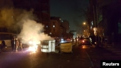FILE - People protest in Tehran, Iran, Dec. 30, 2017 in in this picture obtained from social media.
