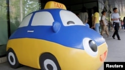 A mascot of Didi Chuxing is seen at the company's headquarters in Beijing, China, May 18, 2016