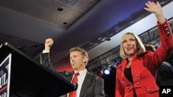 Republican U.S. Senate candidate Rand Paul and his wife Kelley wave to supporters as they arrive for his victory celebration in Bowling Green, Ky., Tuesday, 02 Nov 2010