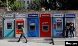 FILE - A row of ATMs in Istanbul, Turkey, September 12, 2017.