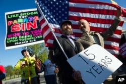 Thousands of supporters and opponents of same-sex marriage rallied outside the courthouse Tuesday.