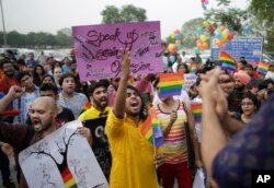 Member of India's LGBT community shout slogans during a parade in Gurgaon on the outskirts of New Delhi, June 25, 2016. The walk was organized to demand social acceptance and equal rights.