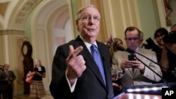 Senate Majority Leader Mitch McConnell, R-Ky., speaks to reporters about the struggle to move Supreme Court nominee Neil Gorsuch toward a final up-or-down vote on the Senate floor, at the Capitol in Washington, April 4, 2017. 