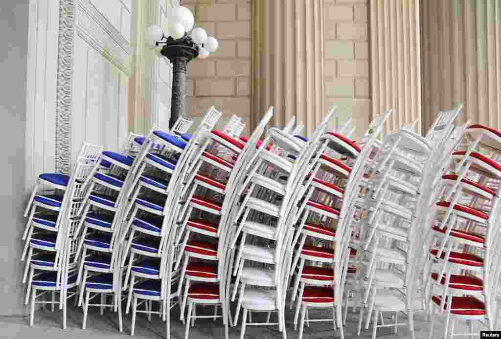 Red, white and blue chairs wait to be deployed at the National Archives ahead of the Fourth of July Independence Day observance in Washington, July 3, 2013.