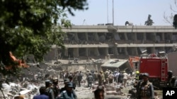 Security forces inspect near the site of an explosion where German Embassy is located in Kabul, Afghanistan, May 31, 2017.