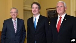 Senate Majority Leader Mitch McConnell of Kentucky, from left, poses for a photo with Supreme Court nominee Brett Kavanaugh and Vice President Mike Pence as they visit Capitol Hill in Washington, July 10, 2018.