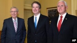 FILE - Senate Majority Leader Mitch McConnell of Kentucky, from left, poses for a photo with Supreme Court nominee Brett Kavanaugh and Vice President Mike Pence as they visit Capitol Hill in Washington, July 10, 2018.