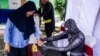 Indonesians Vote Amid Tight Security