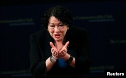 FILE - U.S. Supreme Court justice Sonia Sotomayor gestures to the audience after speaking at The Commonwealth Club of California in San Francisco, California, Jan. 28, 2013.