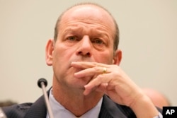 U.S. Citizenship and Immigration Services Director Leon Rodriguez listens to testimony on Capitol Hill in Washington, Nov. 19, 2015, during a House Judiciary Immigration and Border Security subcommittee hearing to examine the Syrian refugee crisis.