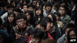 Students take part in a protest at the campus of Hong Kong’s leading university HKU in Hong Kong on Jan. 20, 2016. 