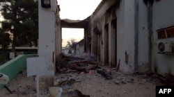 In this photograph released by Medecins Sans Frontieres (MSF) on Oct. 3, 2015, fires burn in part of the MSF hospital in the Afghan city of Kunduz after it was hit by an airstrike.