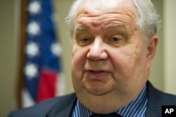 FILE - Sergey Kislyak, Russia's ambassador to the US speaks with reporters following his address on the Syrian situation, at the Center for the National Interest in Washington, Sept. 6, 2013.
