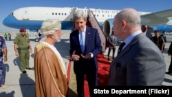 U.S. Secretary of State John Kerry chats with U.S. Ambassador to Oman Marc Sievers, and Omani Foreign Minister Yusuf bin Alawi on November 15, 2016, before the Secretary departed from Muscat International Airport in Muscat, Oman, following a bilateral visit to the country.