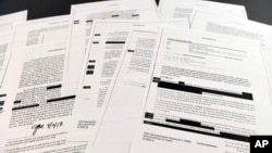 Copies of the memos written by former FBI Director James Comey are photographed in Washington, April 19, 2018. 