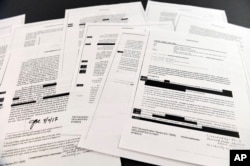 Copies of the memos written by former FBI Director James Comey are photographed in Washington, April 19, 2018.
