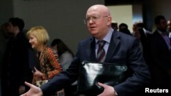 Russian Ambassador to the United Nations Vassily Nebenzia speaks to reporters outside Security Council chambers at the U.N. headquarters in New York, April 12, 2018.