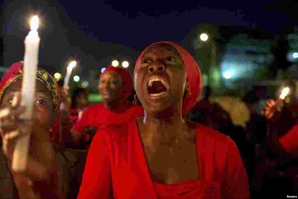 A woman shouts during a vigil in Abuja calling for the release of Nigerian schoolgirls abducted in the remote village of Chibok.