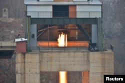 North Korean leader Kim Jong Un watched the ground jet test of a Korean-style high-thrust engine newly developed by the Academy of the National Defence Science in this undated picture provided by KCNA in Pyongyang on March 19, 2017.