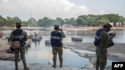 Mexican Marines patrol the banks of the Suchiate River in Ciudad Hidalgo, Chiapas state, Mexico, on January 17, 2021 as a new migrant caravan is expected to get to the Mexican border with Guatemala.