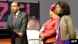 UNAIDS Executive Director Michel Sidibe (L) from Mali speaks at the opening of the Global Village on the 2nd day of the 20th International AIDS Conference at the Melbourne Convention and Exhibition Center (MCEC) in Melbourne, July 21, 2014. 