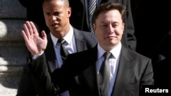 FILE - Tesla CEO Elon Musk leaves Manhattan federal court after a hearing on his fraud settlement with the Securities and Exchange Commission in New York City, April 4, 2019. 
