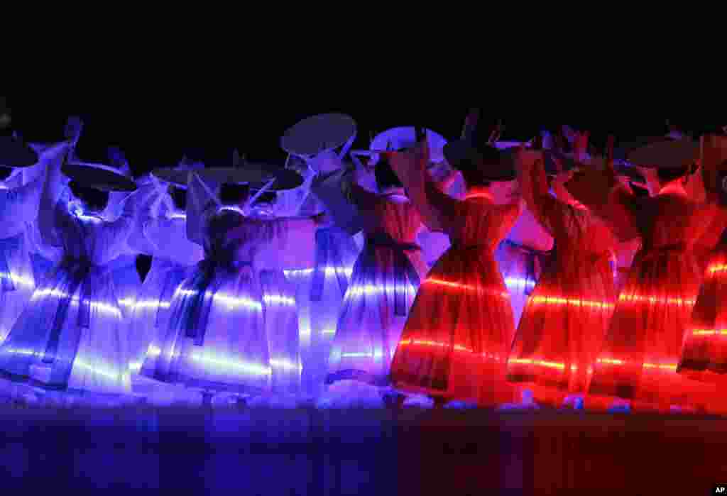 Artists perform during the opening ceremony for the 17th Asian Games in Incheon, South Korea.