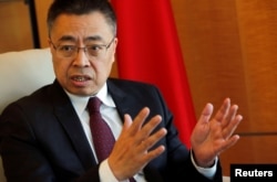 Xiangchen Zhang, Chinese ambassador to the World Trade Organization attends an interview with Reuters in Geneva, Switzerland, March 22, 2018.